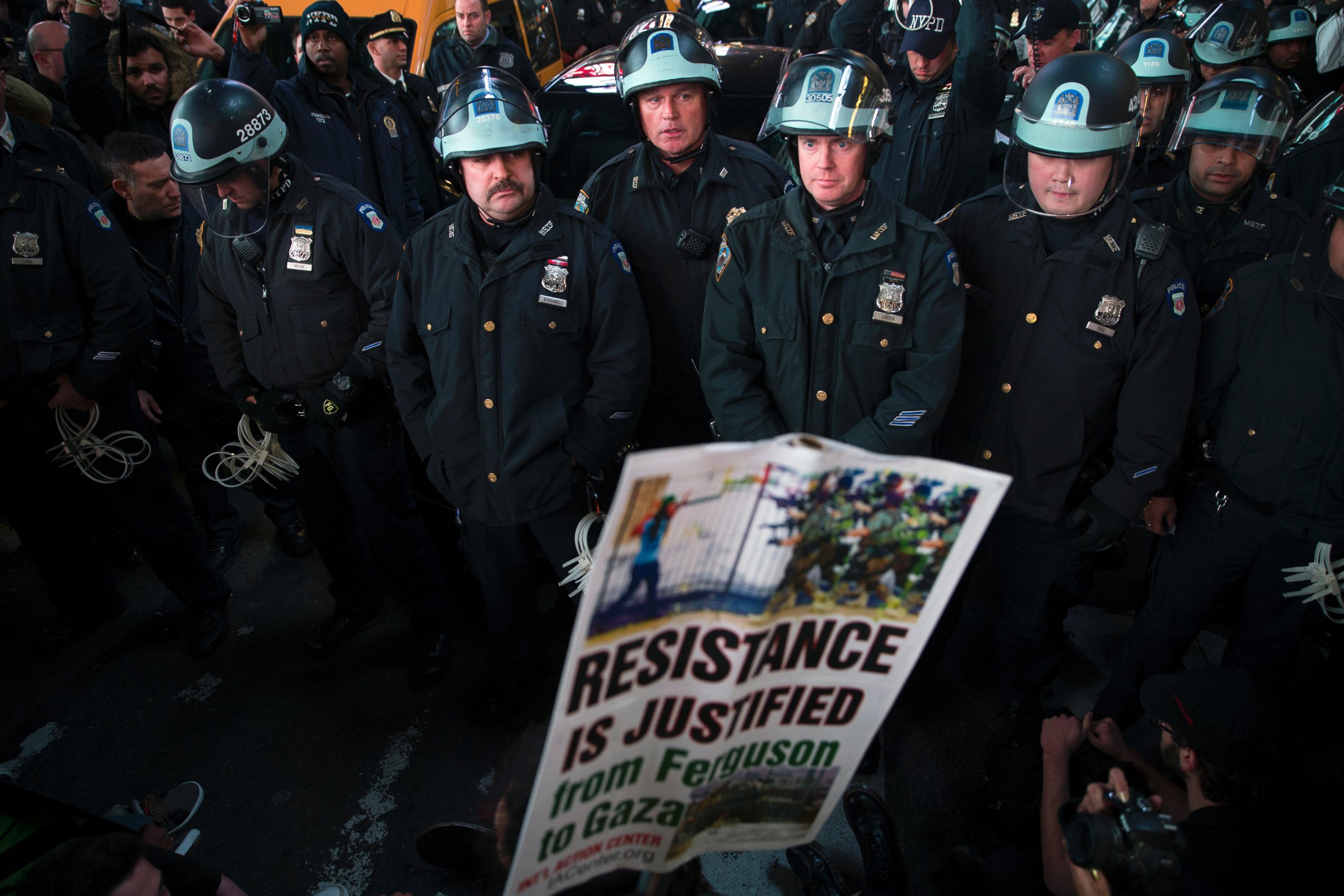 PHOTO: Police block demonstrators as they attempt to make their way through Times Square in protest against a grand jury's decision on Monday not to indict Ferguson police officer Darren Wilson in the shooting of Michael Brown, Nov. 25, 2014, in New York.