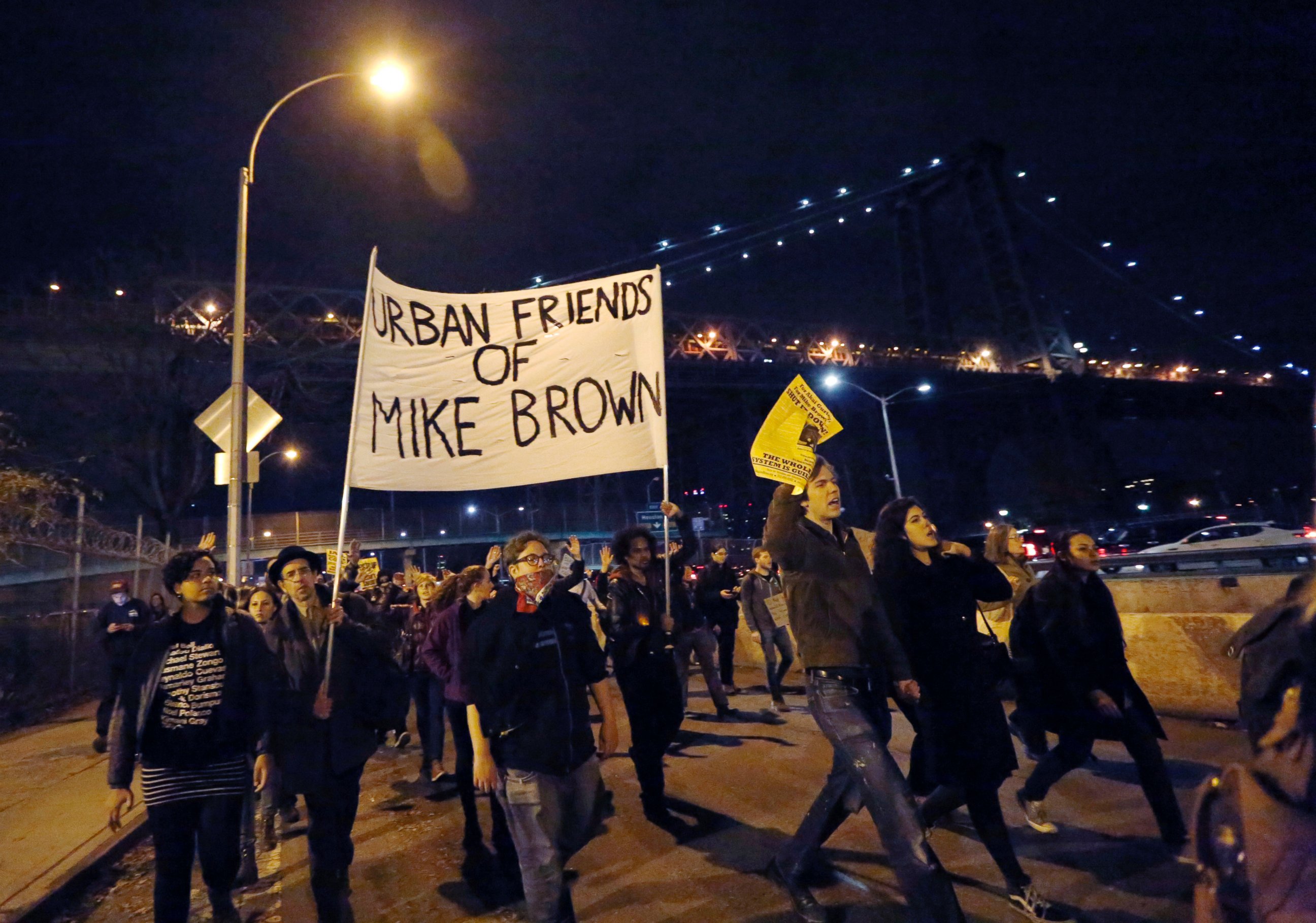 PHOTO: Protesters walk on the FDR Drive during a march in support of the people of Ferguson on the second night of protests after a Missouri grand jury refused to indict police officer Darren Wilson for shooting Michael Brown, in New York, Nov. 25, 2014.