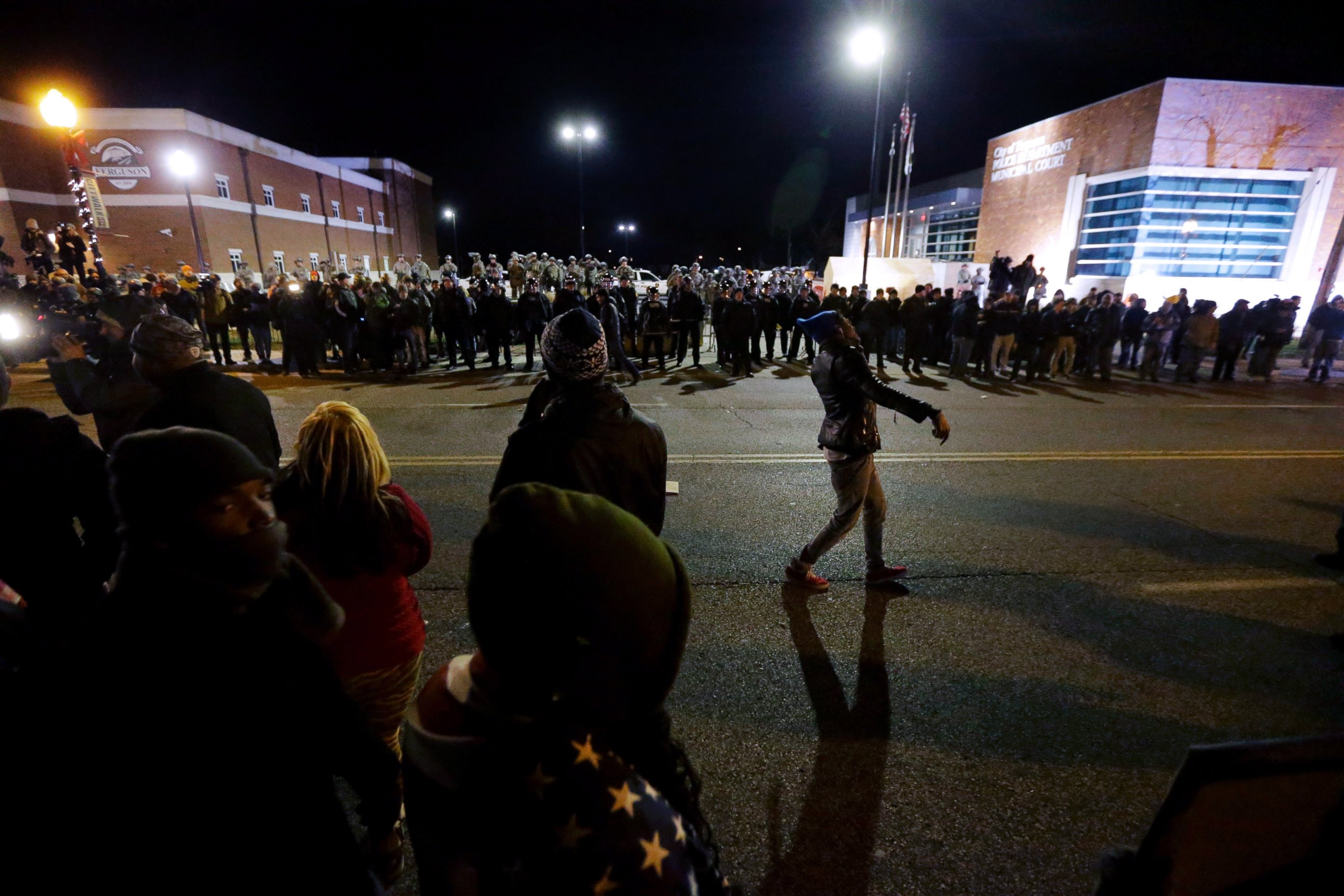 PHOTO: Protesters gather across from the Ferguson Police Department, Tuesday, Nov. 25, 2014, in Ferguson, Mo.