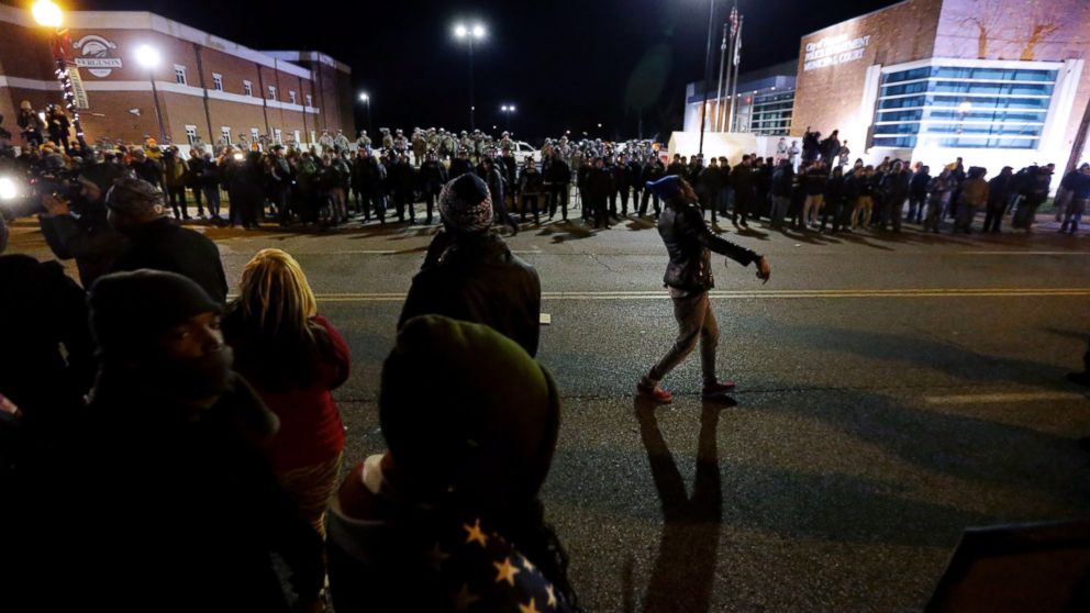 PHOTO: Protesters gather across from the Ferguson Police Department, Tuesday, Nov. 25, 2014, in Ferguson, Mo.