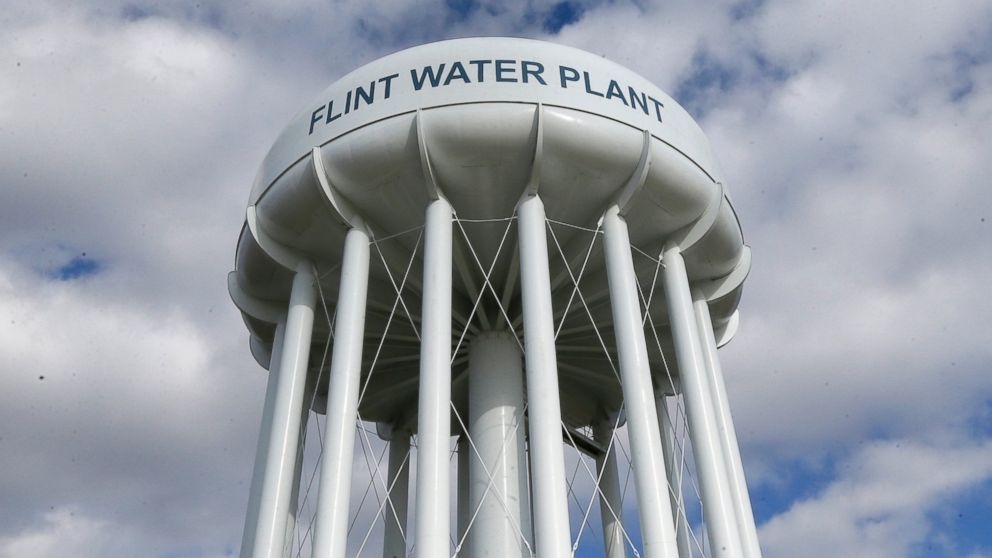 In a March 21, 2016 photo, the Flint Water Plant water tower is seen in Flint, Mich.