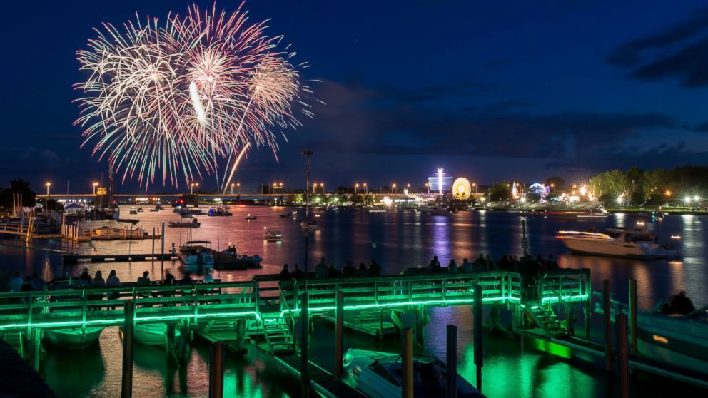 Fireworks light up the sky for the Firework Festival during the fireworks display on July 3, 2014, over the Saginaw River in downtown Bay City. Mich.
