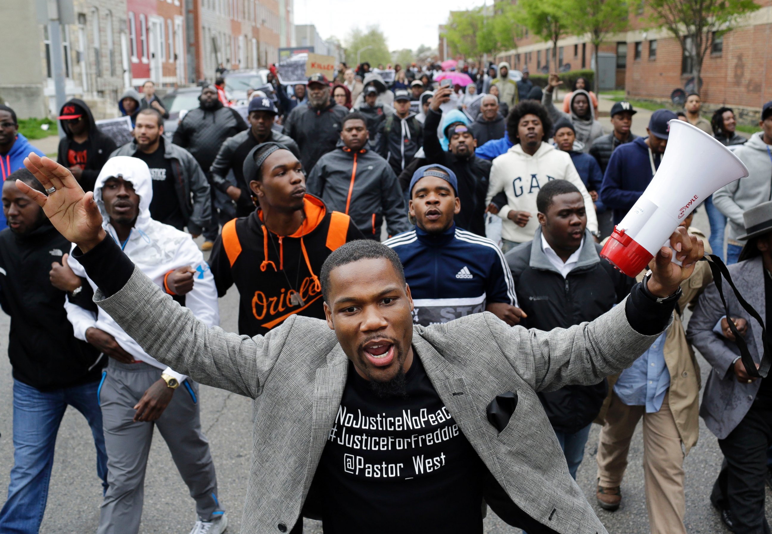 PHOTO: The Rev. Westley West leads a march for Freddie Gray to the Baltimore Police Department's Western District police station, April 22, 2015, in Baltimore. 