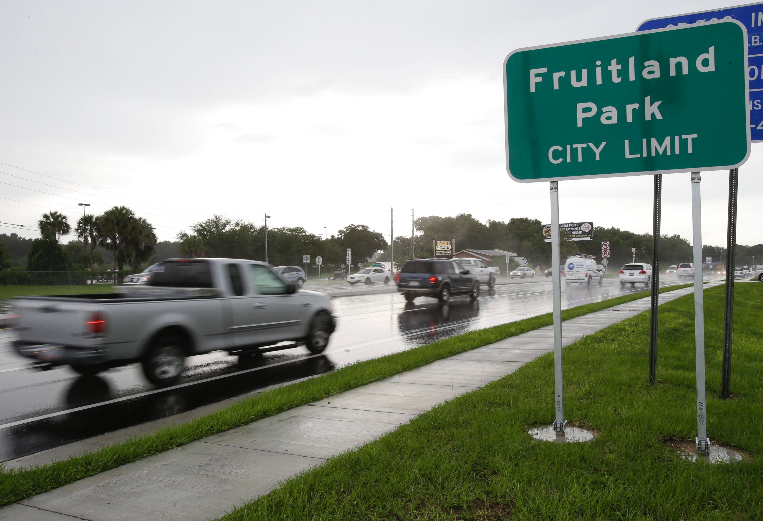 PHOTO: In this July 16, 2014 photo, cars pass by on a six lane highway that runs through Fruitland Park, Fla. 