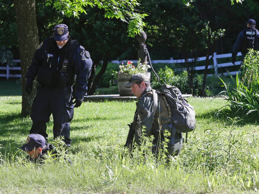 PHOTO: New York State Department of Corrections Officers and a forest ranger patrol an area in Owls Head, N.Y. for convicted murderers Richard Matt and David Sweat, June 26, 2015.