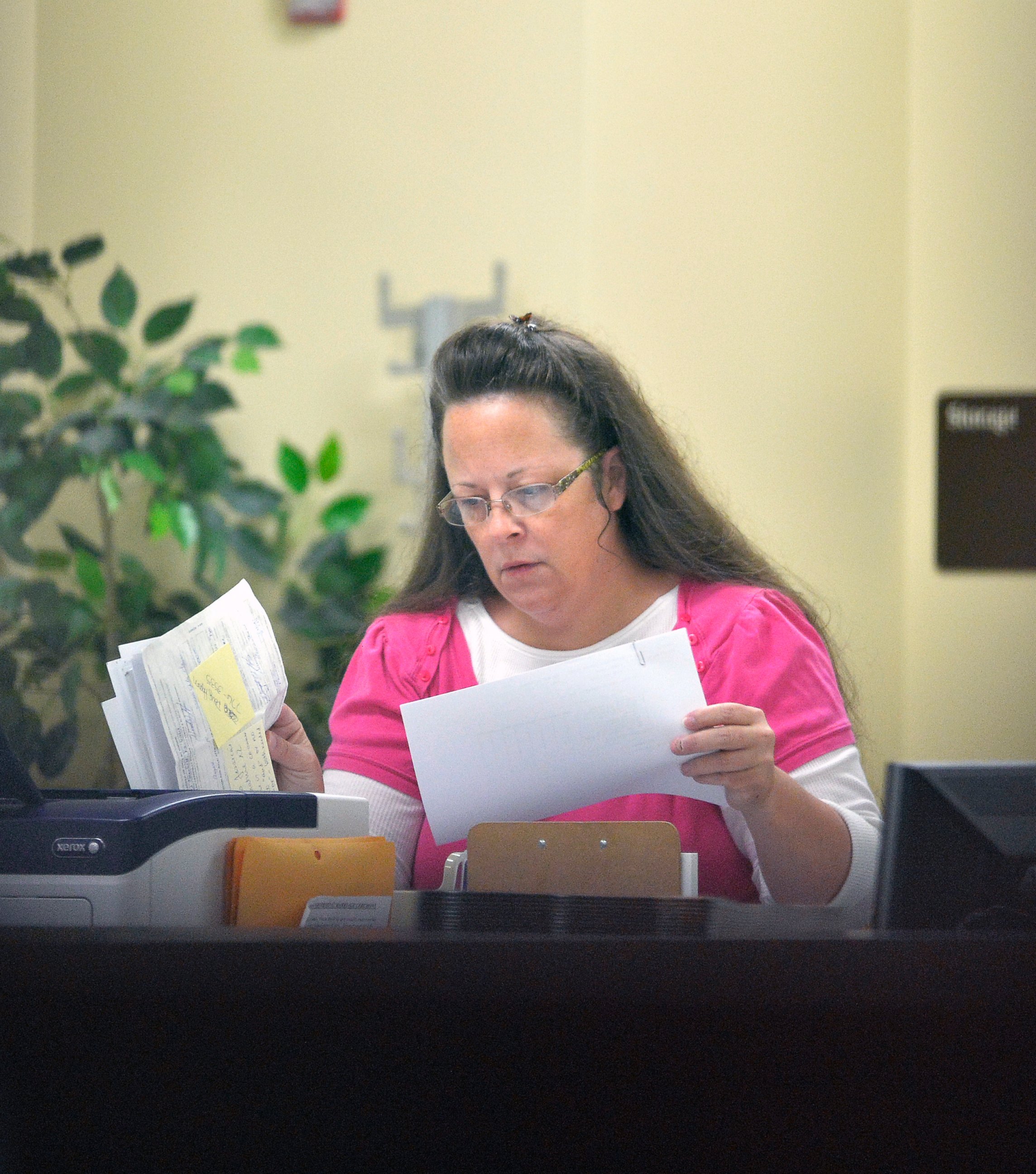 PHOTO: Rowan County Clerk Kim Davis performs her job at the Rowan County Courthouse in Morehead, Ky., Aug. 18, 2015.