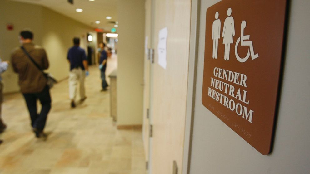 A sign marks the entrance to a gender neutral restroom at the University of Vermont in Burlington, Vt.,  Aug. 23, 2007.