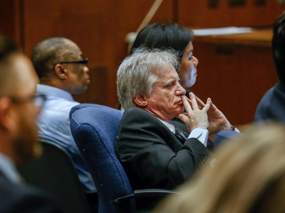 PHOTO: Lonnie Franklin Jr., left rear, appears with his defense attorney Seymour Amster, center, in Los Angeles Superior Court for opening statements in his trial on Feb. 16, 2016.