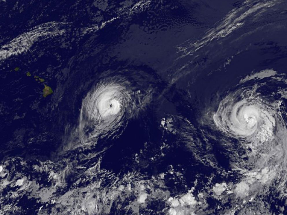 PHOTO: This image provided by NOAA taken Aug. 7, 2014 at 2 a.m. EDT shows Hurricane Iselle, left and Hurricane Julio approaching Hawaii.
