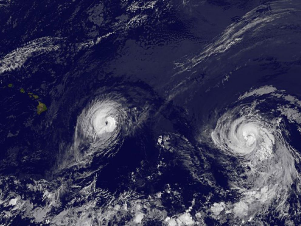 PHOTO: This image provided by NOAA taken Aug. 7, 2014 at 2 a.m. EDT shows Hurricane Iselle, left and Hurricane Julio approaching Hawaii.