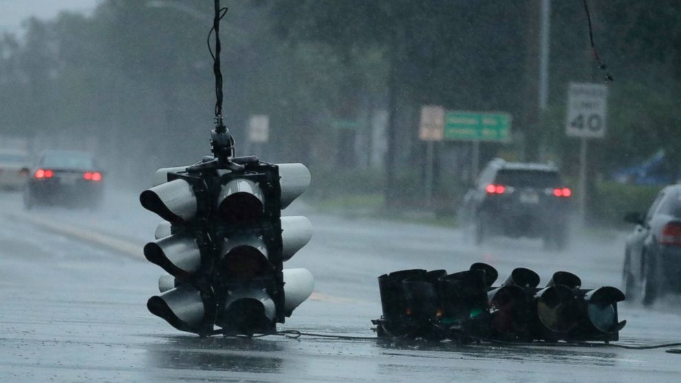 PHOTO: A traffic light hangs in an intersection as Hurricane Matthew moves through Jacksonville, Fla., Oct. 7, 2016.