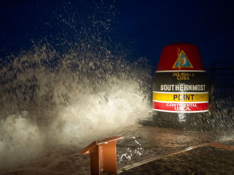 PHOTO: Waves crash against the Southernmost Point in Key West, Fla., Saturday, Sept. 9, 2017. Hurricane Irmas leading edge bent palm trees and spit rain as the storm swirled toward Florida on Saturday.