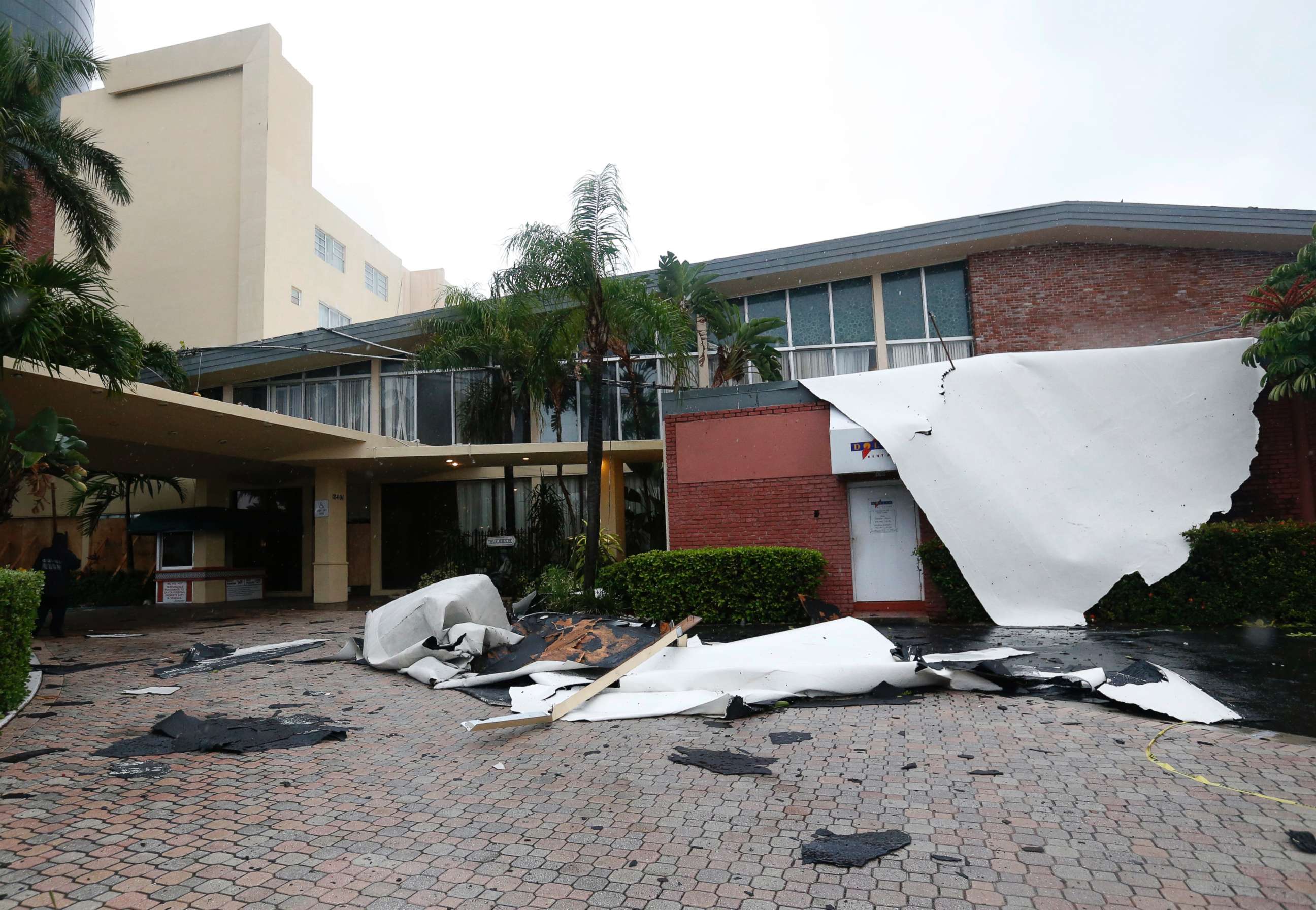 PHOTO: Roof damage caused by high winds brought on by Hurricane Irma is shown, Saturday, Sept. 9, 2017, in Sunny Isles Beach, Fla.