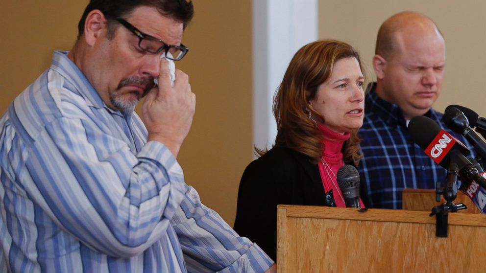 PHOTO: Will Corporon, left, and Tony Corporon, right, fight emotions while Mindy Losen, center, talks about her son and father during a news conference at their church in Leawood, Kan., April 14, 2014.