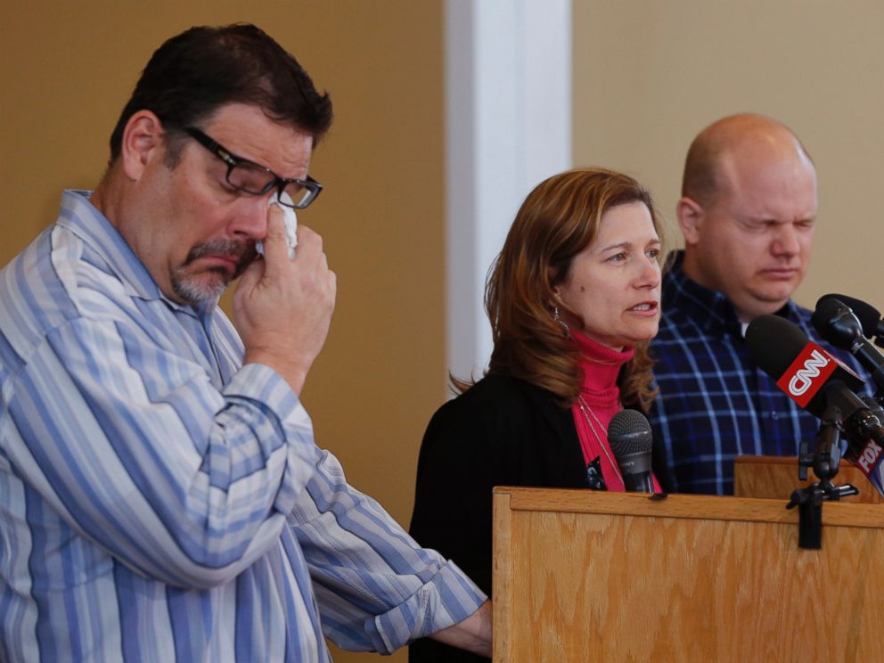 PHOTO: Will Corporon, left, and Tony Corporon, right, fight emotions while Mindy Losen, center, talks about her son and father during a news conference at their church in Leawood, Kan., April 14, 2014.