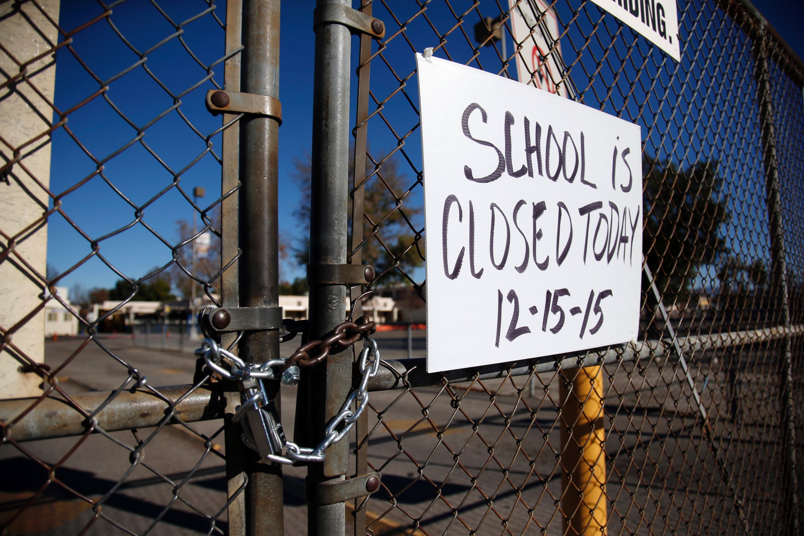 PHOTO: A gate to Birmingham Community Charter High School is locked with a sign stating that school is closed, Dec. 15, 2015, in Van Nuys, Calif.