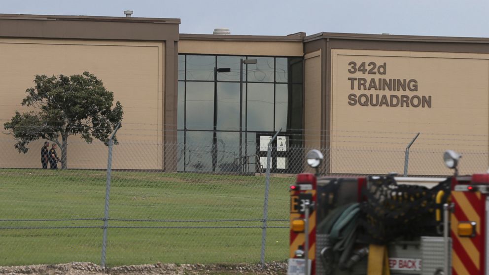 PHOTO: Two Bexar County Sheriff's Deputies stand outside a building near the scene of a shooting at Joint Base San Antonio-Lackland, Friday, April 8, 2016, in San Antonio, Texas.