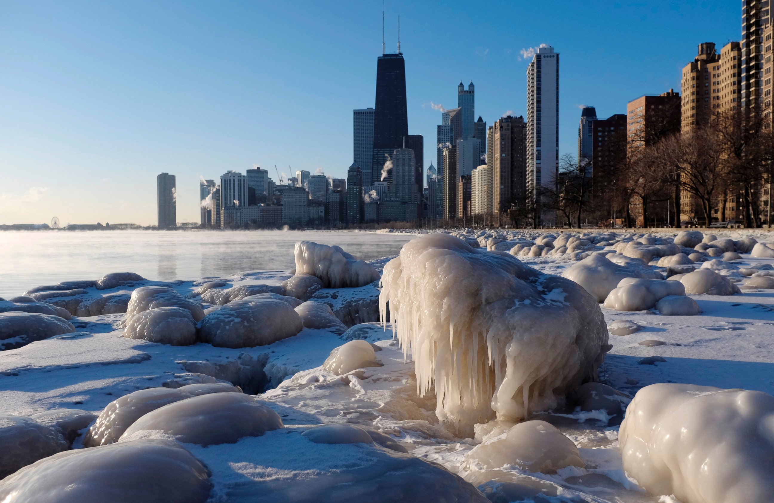 PHOTO: Ice forms along the shore of Lake Michigan, Feb. 19, 2015, in Chicago. 
