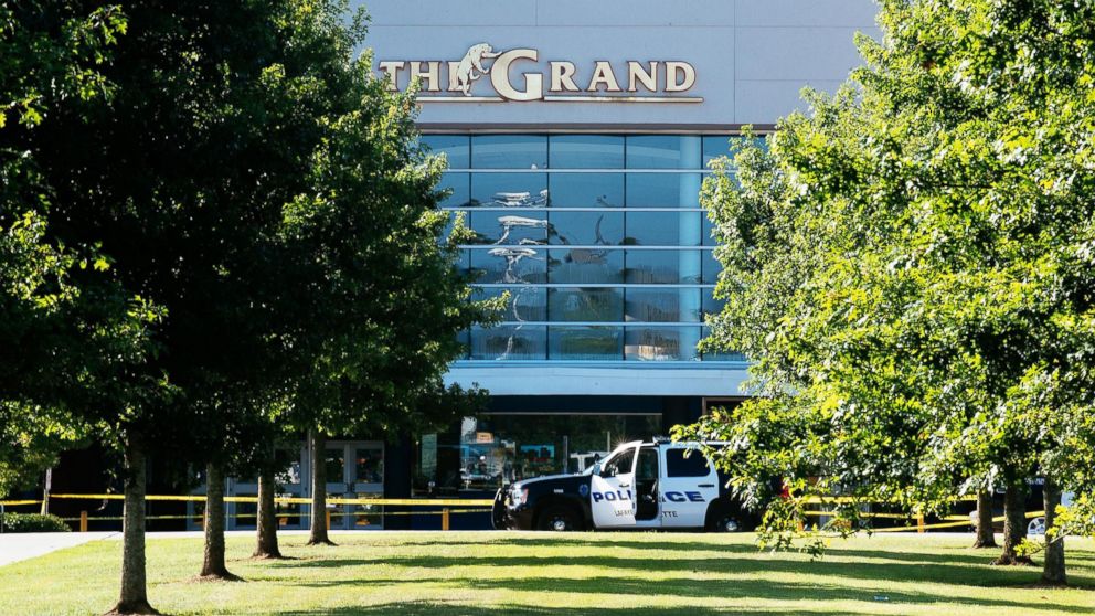 Authorities park at the scene of a shooting at The Grand Theatre, in Lafayette, La. on July 24, 2015. 