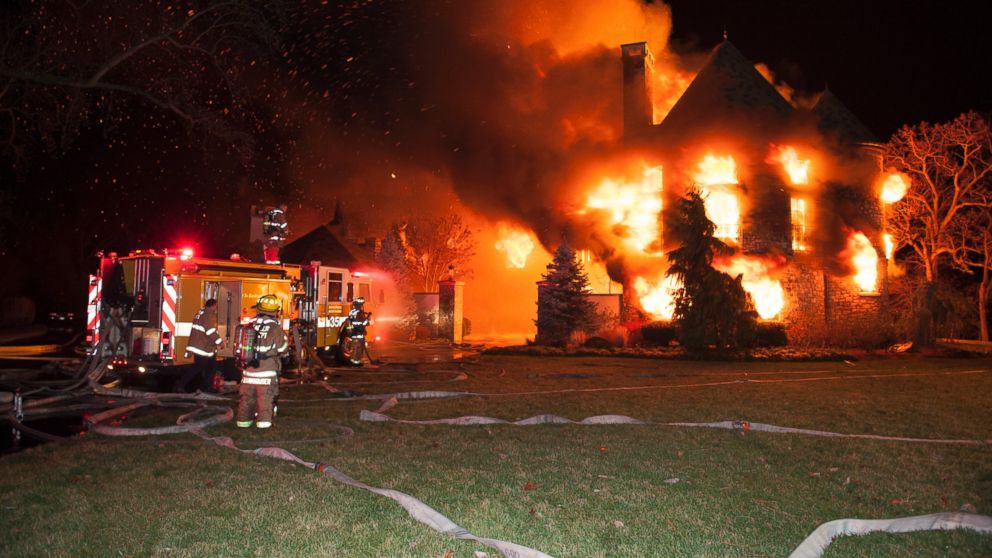 PHOTO: Firefighters battle a four-alarm fire at a home on Childs Point Road, Jan. 19, 2015, in Annapolis, Md. 