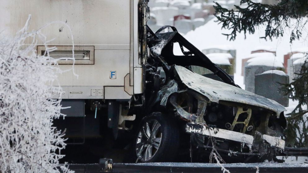 PHOTO: A sports utility vehicle remains crushed and burned at the front of a Metro-North train, on Feb. 4, 2015, in Valhalla, N.Y.  