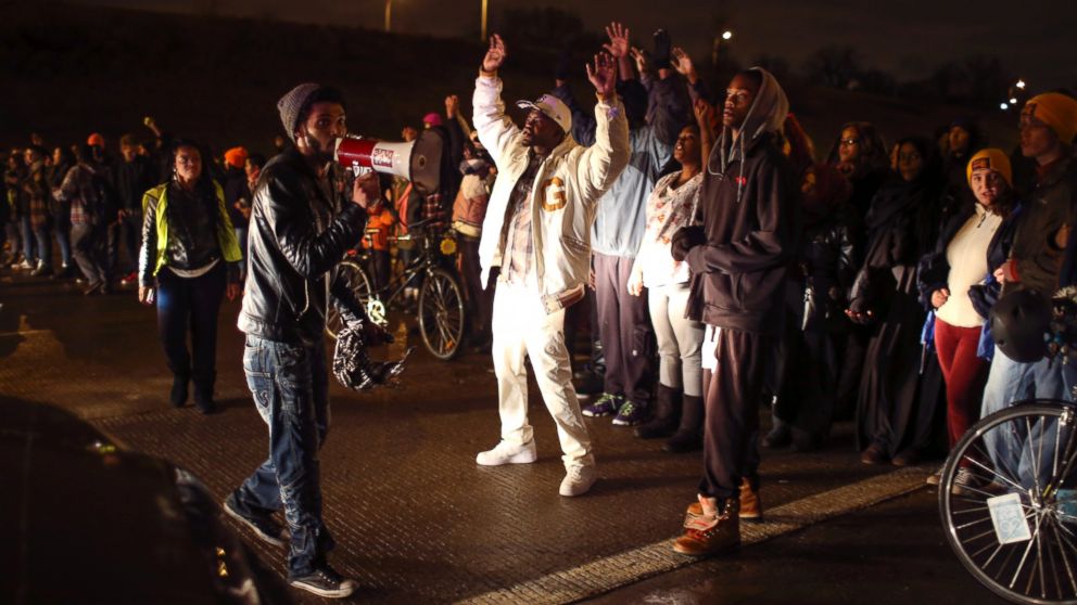 PHOTO: Demonstrators block a portion of Interstate 94, shutting down the northbound lanes, Nov. 16, 2015, in Minneapolis.