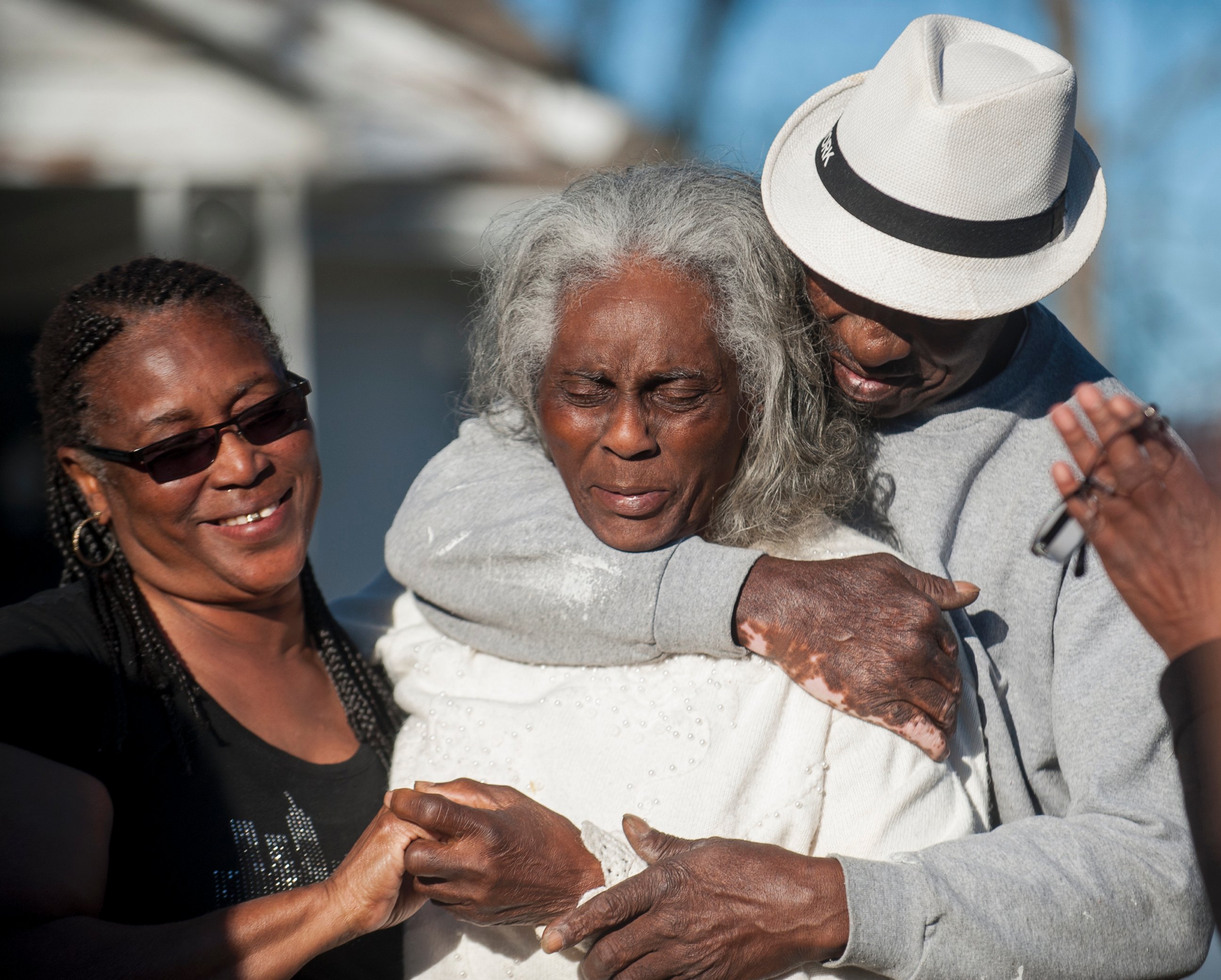 PHOTO: Nellie Ruth Gunn is comforted by supporters after Montgomery District Attorney Daryl Bailey announced on Wednesday, March 2, 2016, that Montgomery Police Officer Aaron Smith was arrested in connection to the shooting death of her son Greg Gunn.