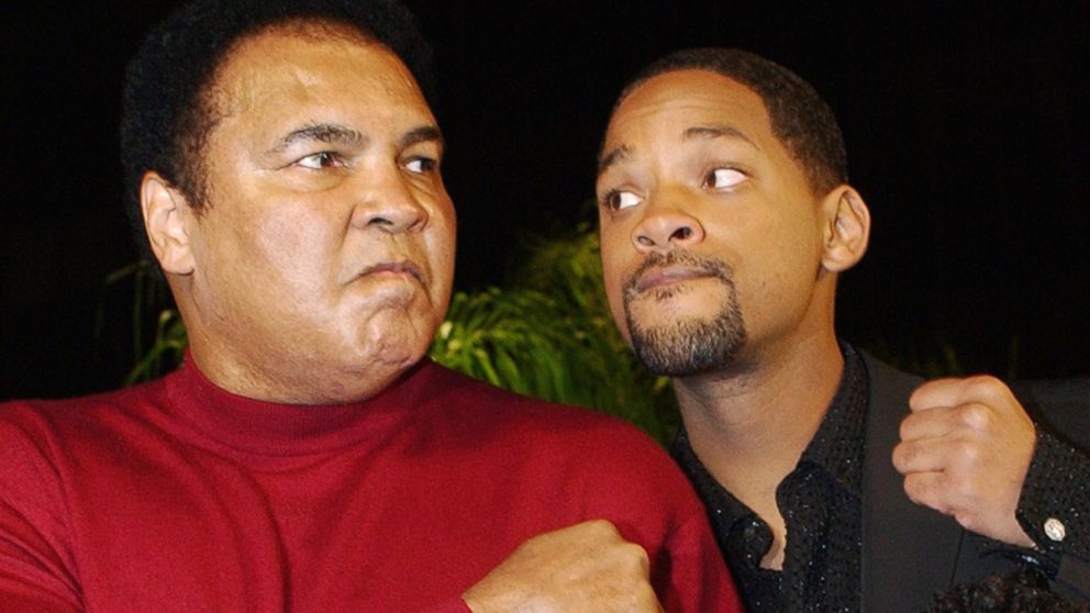 PHOTO: Muhammad Ali and Will Smith pose at the premiere of the film "Ali," in Los Angeles, Dec. 12, 2001.