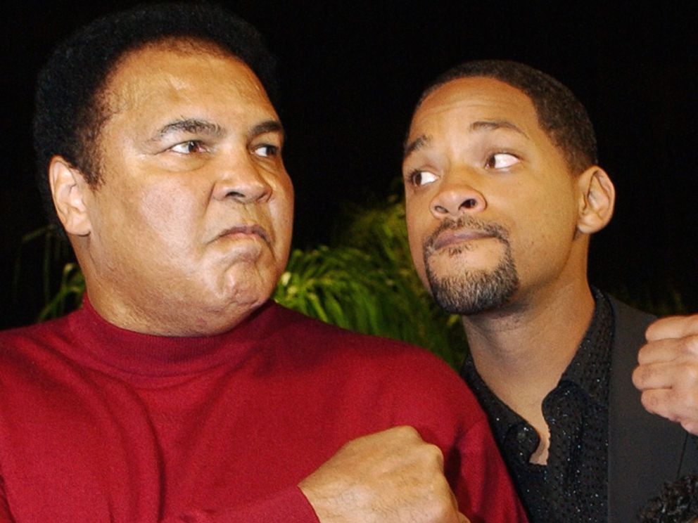 PHOTO: Muhammad Ali and Will Smith pose at the premiere of the film "Ali," in Los Angeles, Dec. 12, 2001.