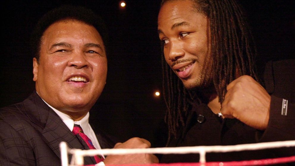 PHOTO: Former Heavyweight Champion Muhammad Ali joins then Heavyweight Champion Lennox Lewis at an event in London, Jan. 15, 2001.