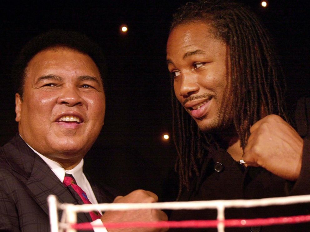 PHOTO: Former Heavyweight Champion Muhammad Ali joins then Heavyweight Champion Lennox Lewis at an event in London, Jan. 15, 2001.