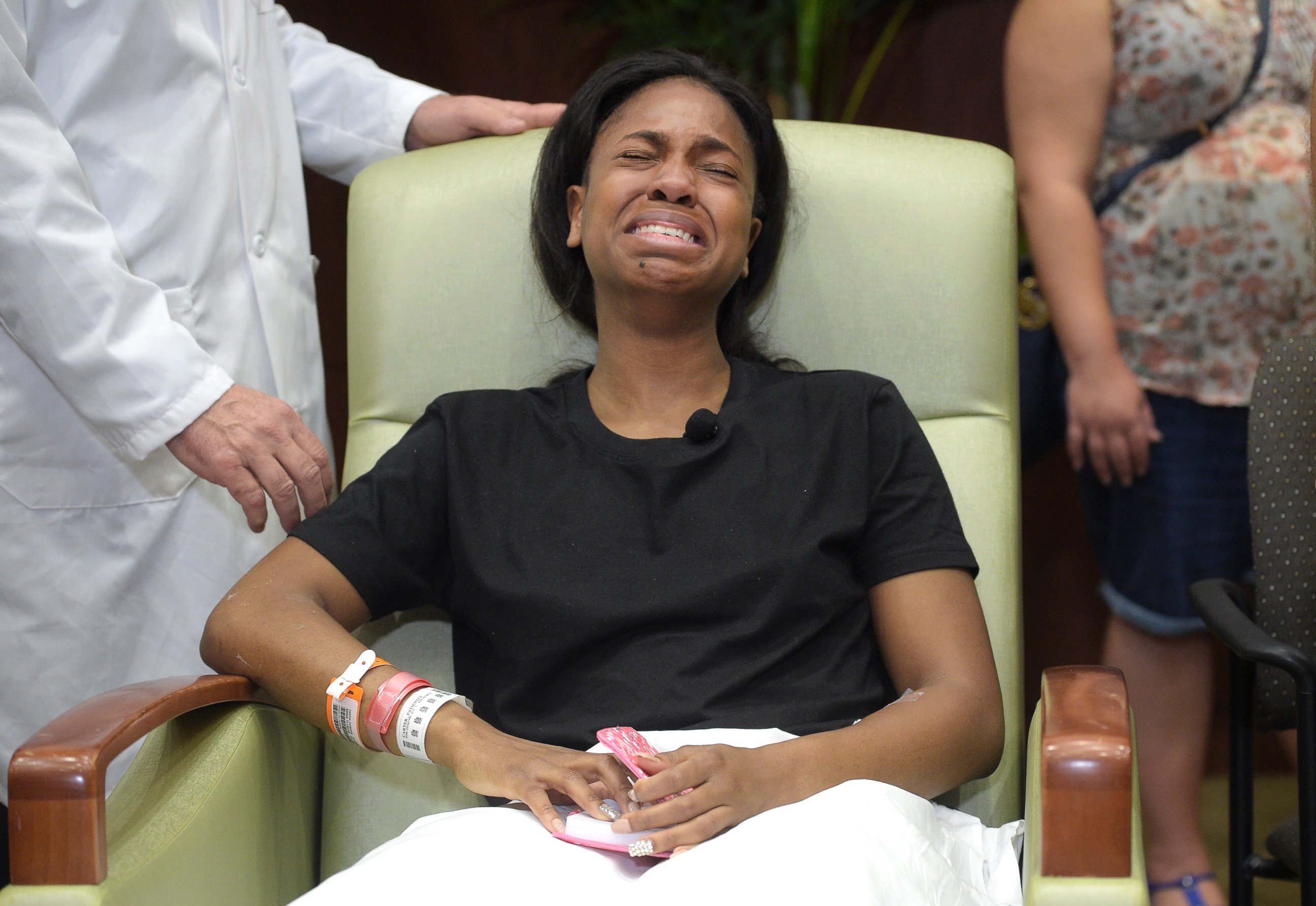 PHOTO: Patience Carter, a victim in the Pulse nightclub shooting from Philadelphia, becomes emotional after giving her story during a news conference at Florida Hospital Orlando, June 14, 2016, in Orlando, F