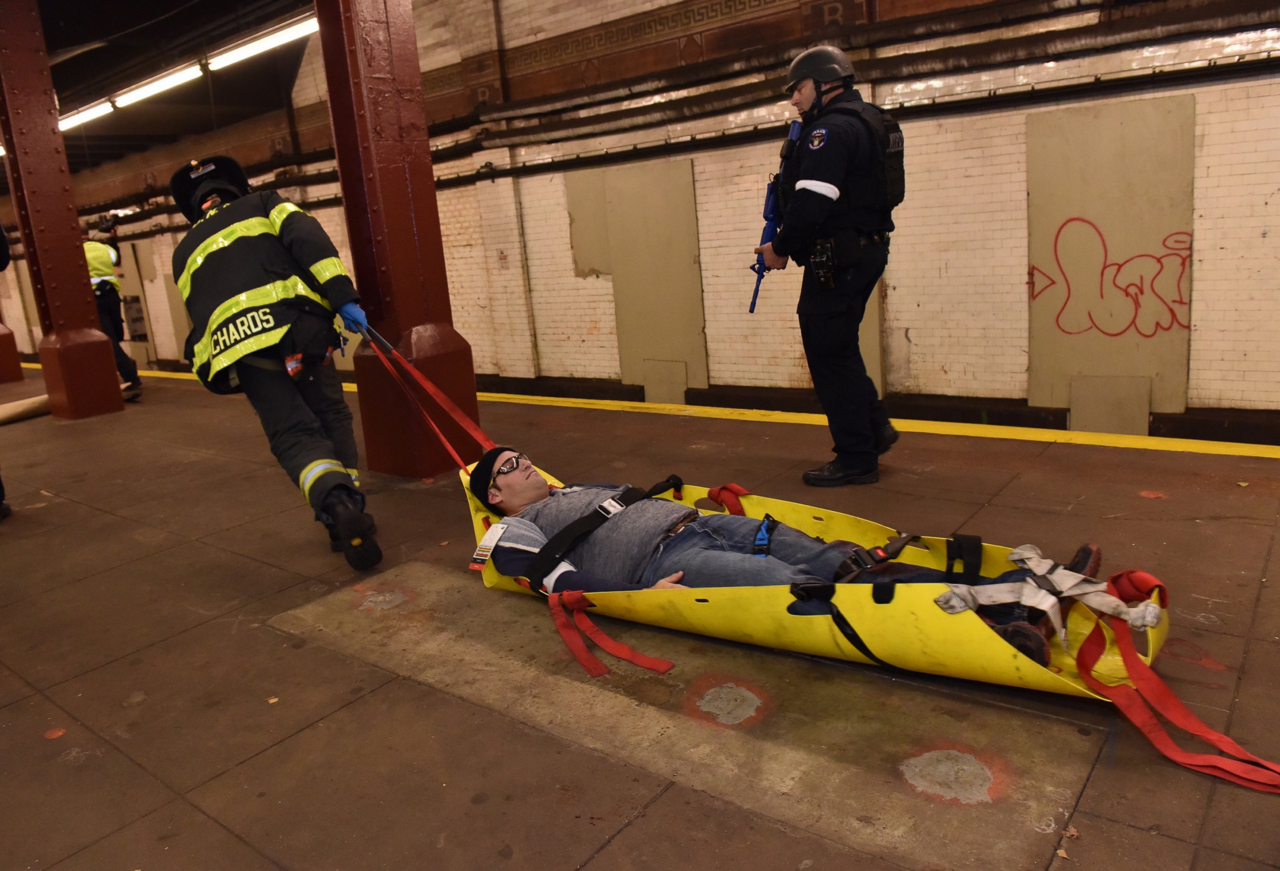 PHOTO: In an abandoned subway station in a lower Manhattan, emergency responders stage a drill simulating a terrorist attack Sunday, Nov. 22, 2015, in New York.