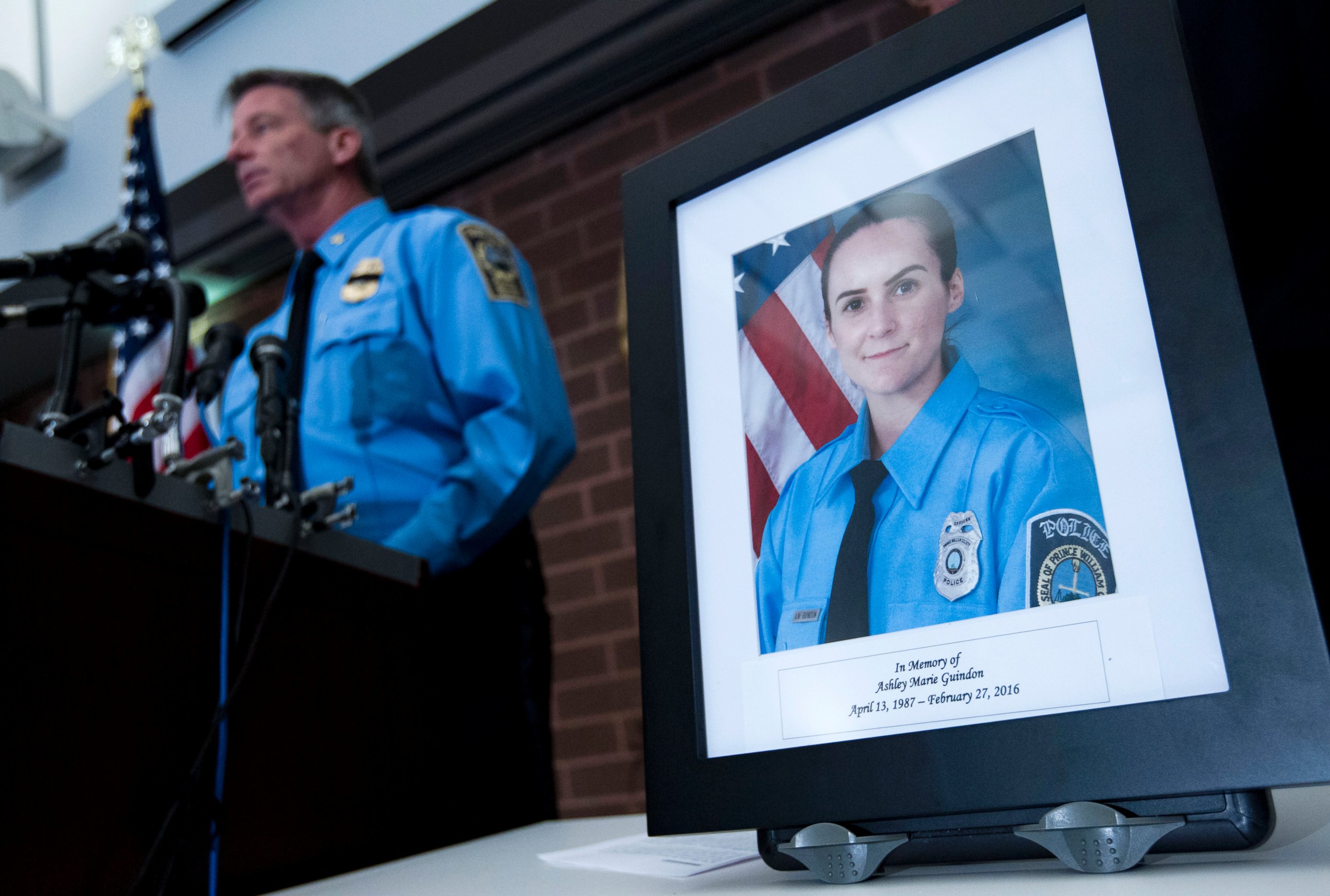 PHOTO: Prince William County Police Chief Stephan Hudson speaks during a news conference next to a picture of Ashley Guindon at Western District Station, in Manassas, Va., Feb. 28, 2016, about a fatal shooting Saturday evening.