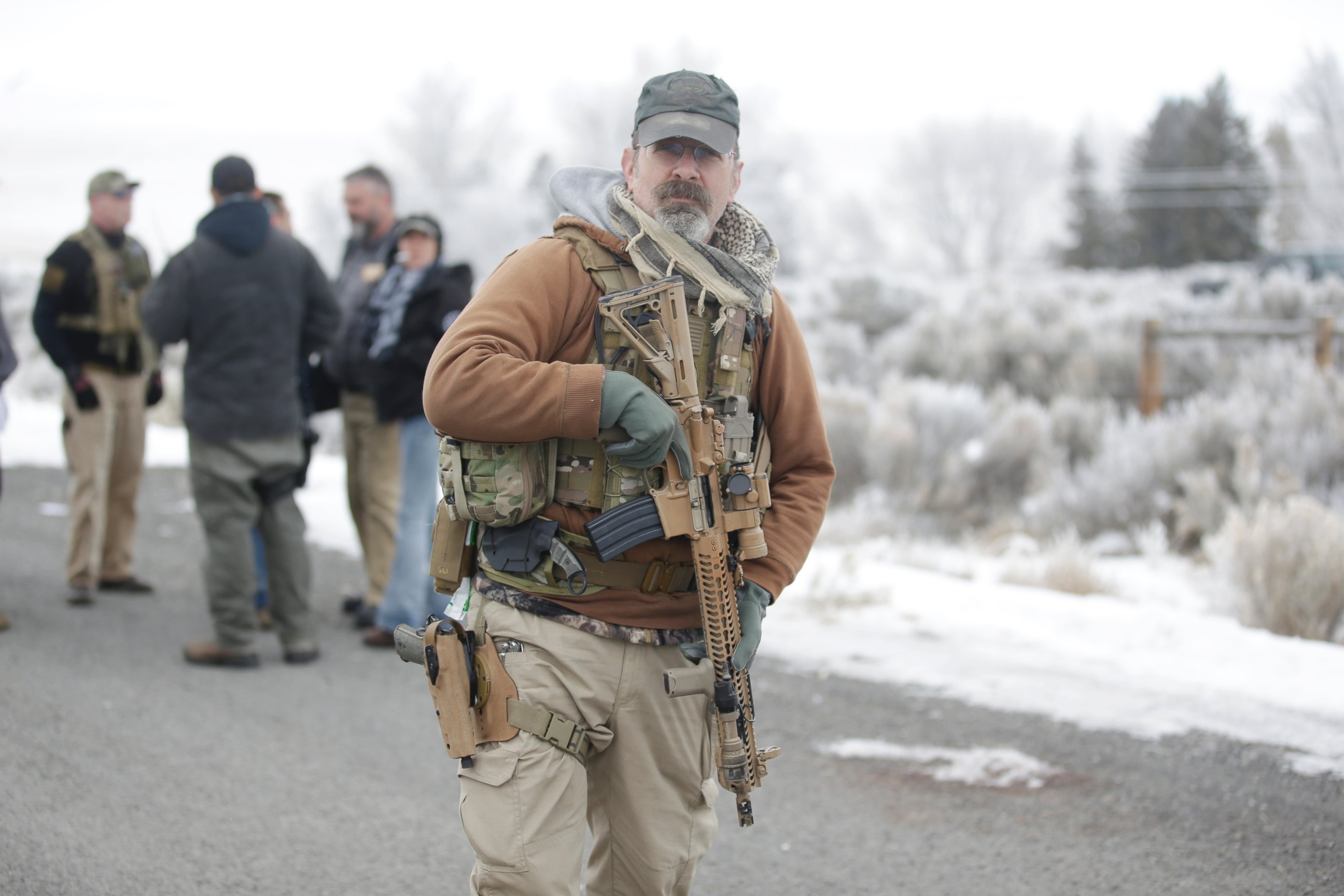 PHOTO: A man stands guard after members of the "3% of Idaho" group along with several other organizations arrived at the Malheur National Wildlife Refuge near Burns, Ore., on Saturday, Jan. 9, 2016.