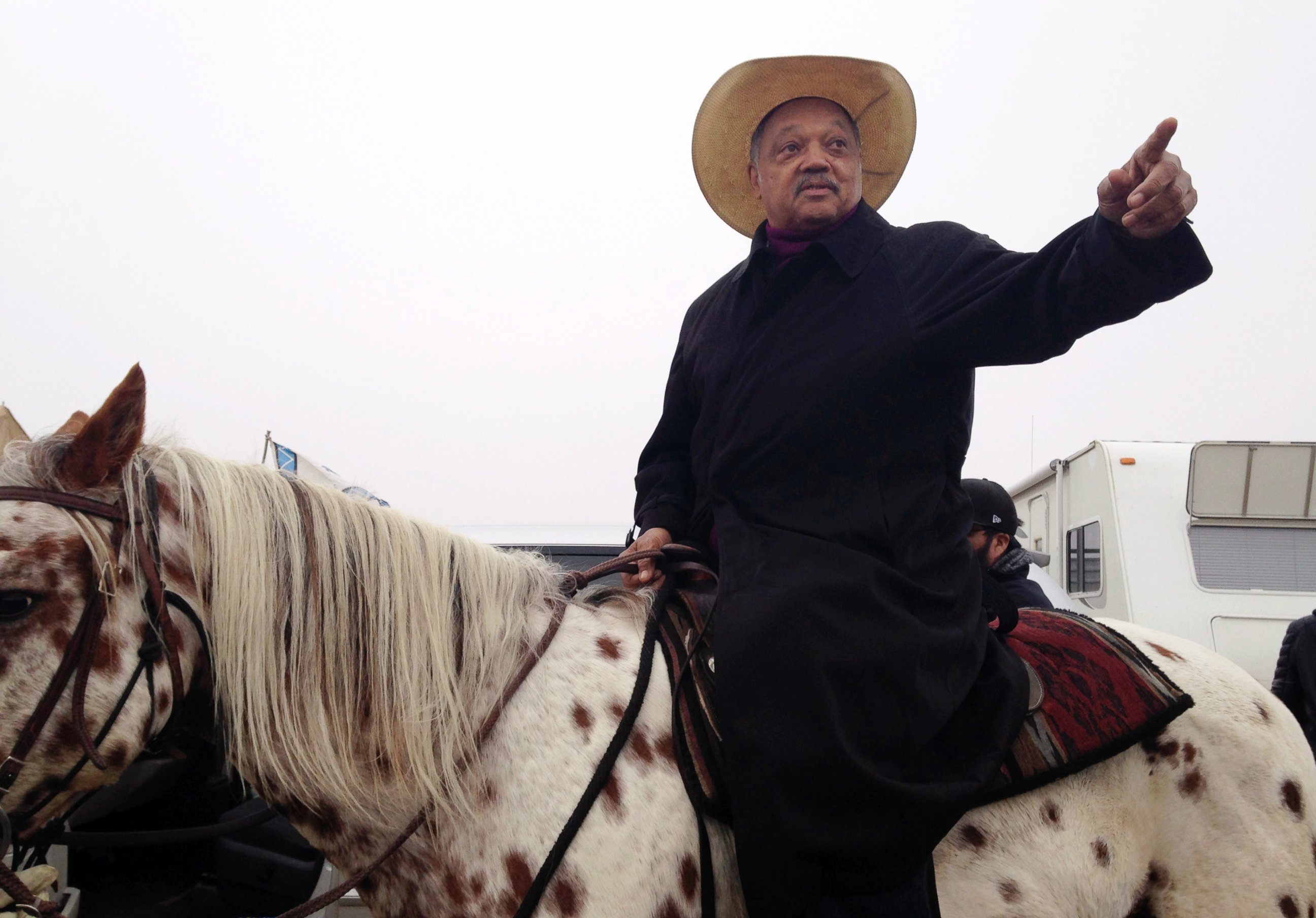 PHOTO: Civil rights activist Jesse Jackson sits atop a horse, Oct. 26, 2016, while visiting the protest camp against the Dakota Access oil pipeline outside Cannon Ball, North Dakota.