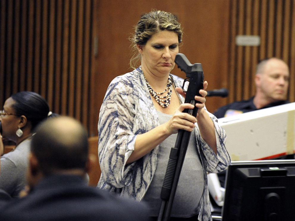 PHOTO: Wayne County Assistant Prosecutor Danielle Hagaman-Clark holds the gun used to kill Renisha McBride during the Theodore Wafer trial in Detroit on July 24, 2014.