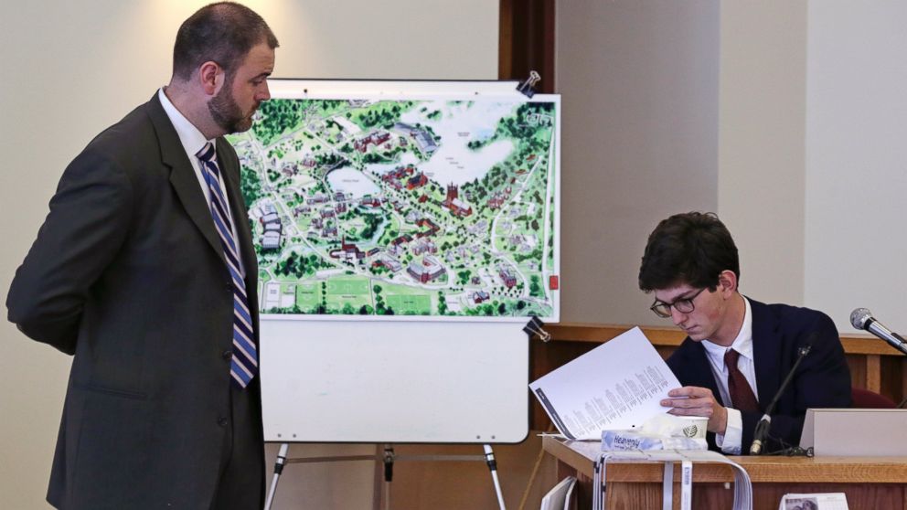 PHOTO: Prosecutor Joseph Cherniske, left, watches as former St. Paul's School student Owen Labrie examines phone text and Facebook message copies during Labrie's trial at Merrimack Superior Court in Concord, N.H., Aug. 26, 2015.