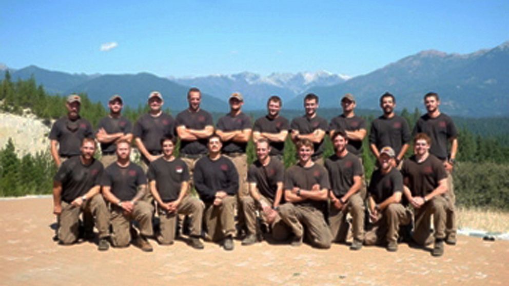 Unidentified members of the Granite Mountain Interagency Hotshot Crew from Prescott, Ariz., pose together in this undated photo provided by the City of Prescott. Some of the men in this photograph were among the 19 firefighters killed while battling an out-of-control wildfire near Yarnell, Ariz., on June 30, 2013, according to Prescott Fire Chief Dan Fraijo. 