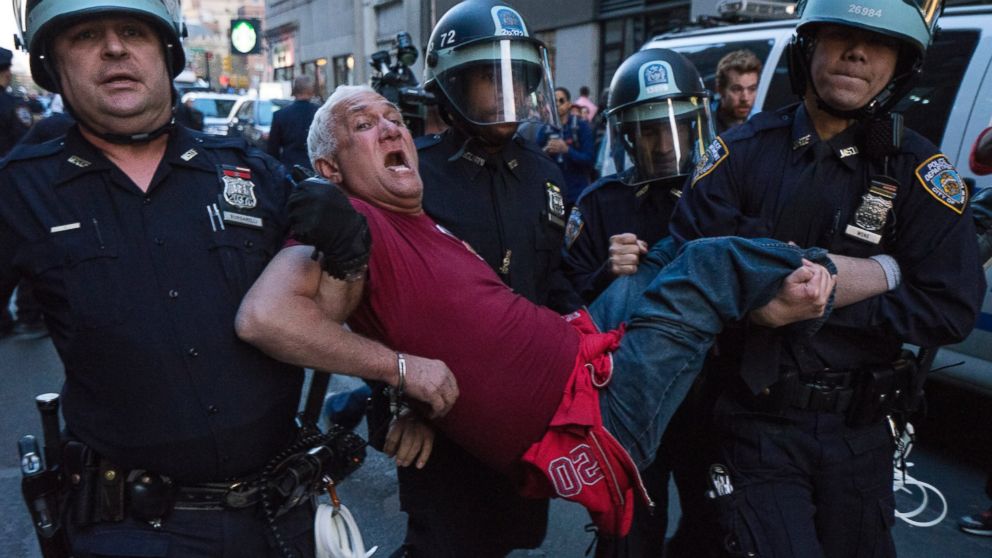 PHOTO: A man is carried by police officers as arrests are made at Union Square, Wednesday, April 29, 2015, in New York. People gathered to protest the death of Freddie Gray, a Baltimore man who was critically injured in police custody.