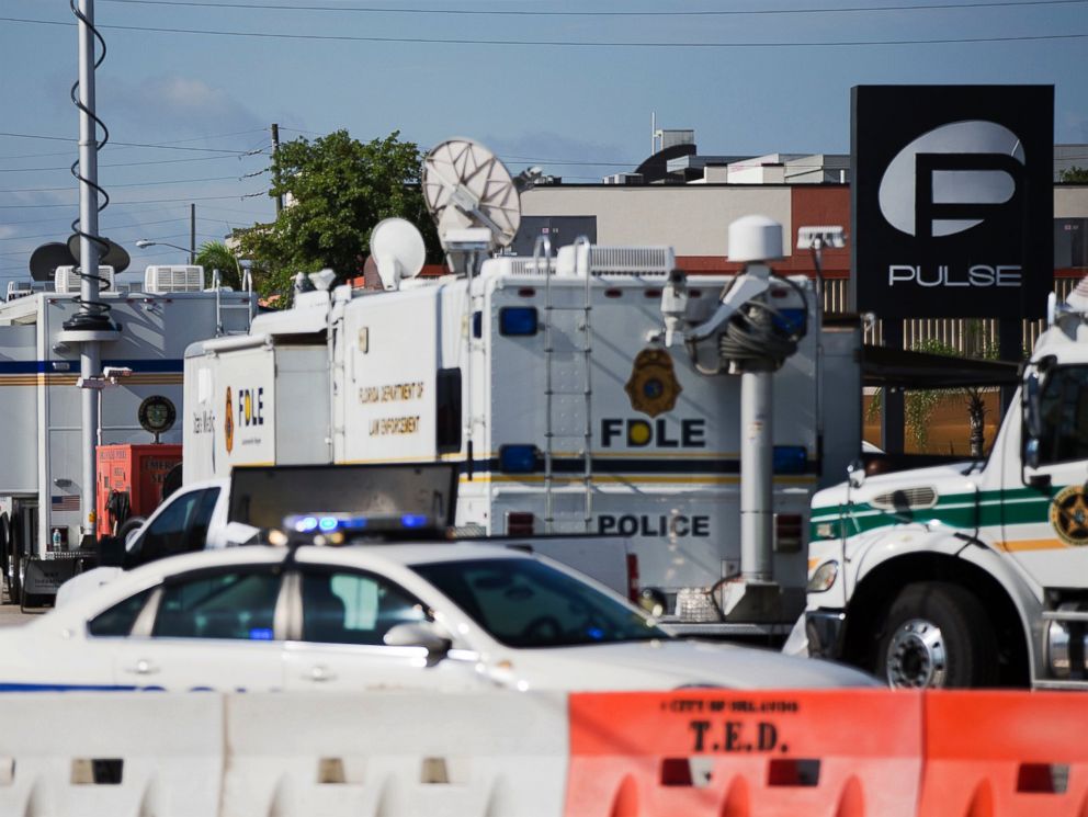 PHOTO: Law enforcement mobile command vehicles line the street next to the scene of the Pulse nightclub mass shooting, June 16, 2016, in Orlando, Florida.