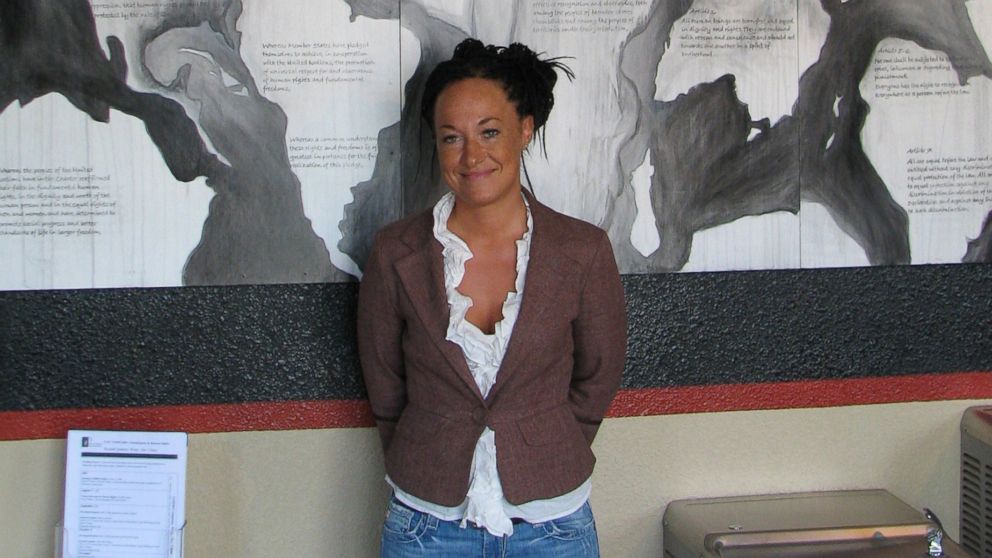 PHOTO: In this July 24, 2009, file photo, Rachel Dolezal, a leader of the Human Rights Education Institute, stands in front of a mural she painted at the institute's offices in Coeur d'Alene, Idaho. 