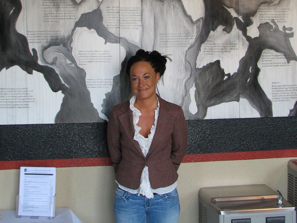 PHOTO: In this July 24, 2009, file photo, Rachel Dolezal, a leader of the Human Rights Education Institute, stands in front of a mural she painted at the institutes offices in Coeur dAlene, Idaho.