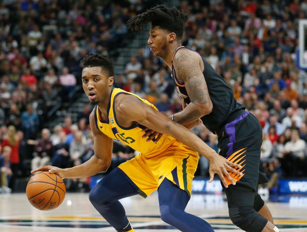 PHOTO: Phoenix Suns guard Elfrid Payton, right, guards Utah Jazz guard Donovan Mitchell, left, in the first half during an NBA basketball game Wednesday, Feb. 14, 2018, in Salt Lake City.  