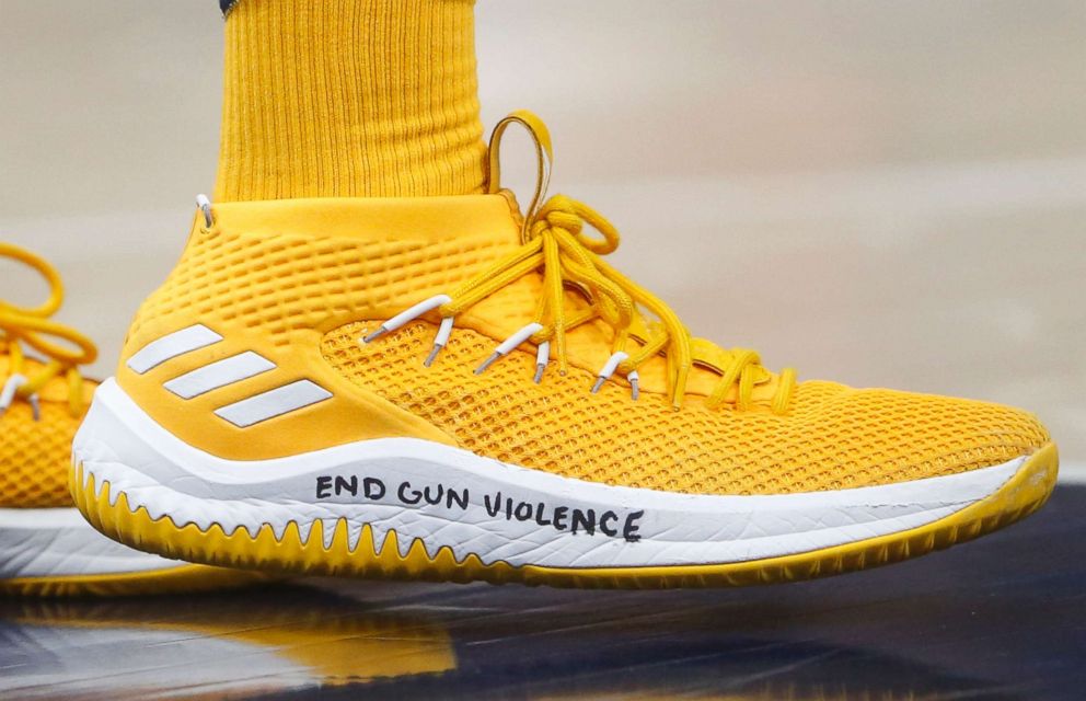 PHOTO: Utah Jazz guard Donovan Mitchell wears a shoe with "End gun violence" written on it, during the second half of the team's NBA basketball game against the Phoenix Suns on Wednesday, Feb. 14, 2018, in Salt Lake City. 