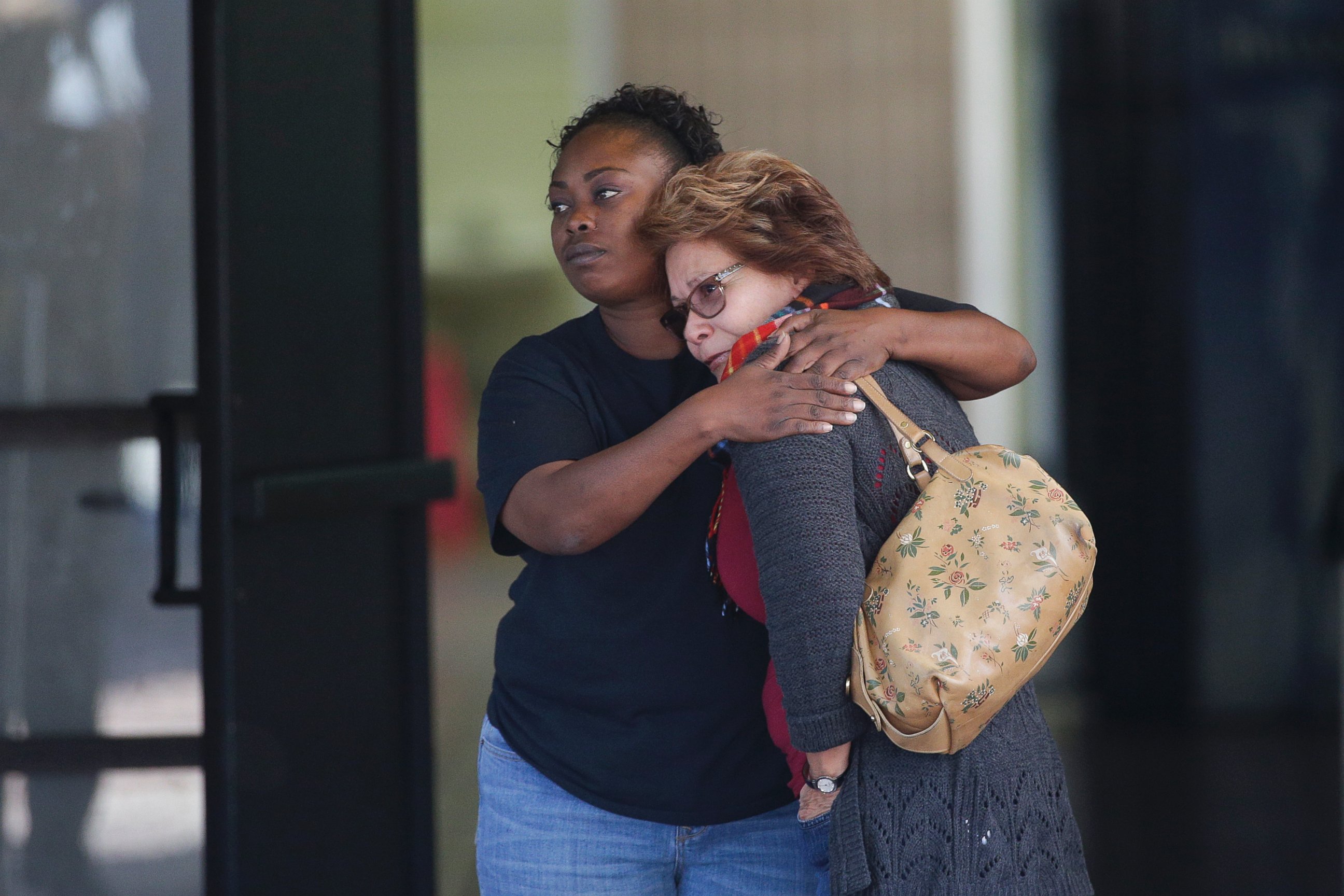 PHOTO: Two women embrace at a community center where family members are gathering to pick up survivors after a shooting rampage that killed multiple people and wounded others at a social services center in San Bernardino, Calif., Dec. 2, 2015. 
