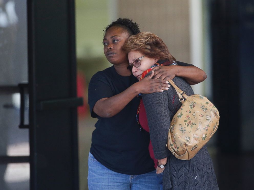 PHOTO: Two women embrace at a community center where family members are gathering to pick up survivors after a shooting rampage that killed multiple people and wounded others at a social services center in San Bernardino, Calif., Dec. 2, 2015.