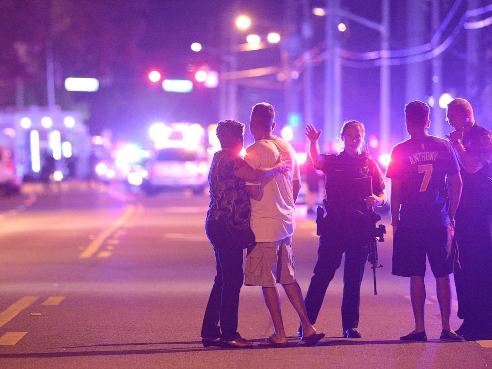 PHOTO: Orlando Police officers direct family members away from a multiple shooting at a nightclub in Orlando, Fla., Sunday, June 12, 2016.