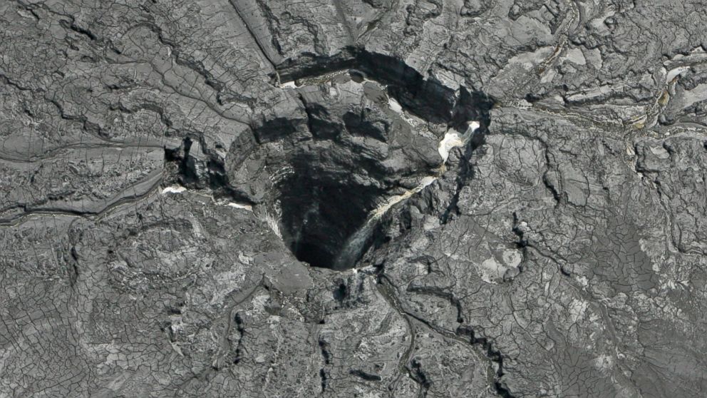 PHOTO: This aerial photo shows a massive sinkhole Friday, Sept. 16, 2016, in Mulberry, Florida, that opened up underneath a gypsum stack at a Mosaic phosphate fertilizer plant.