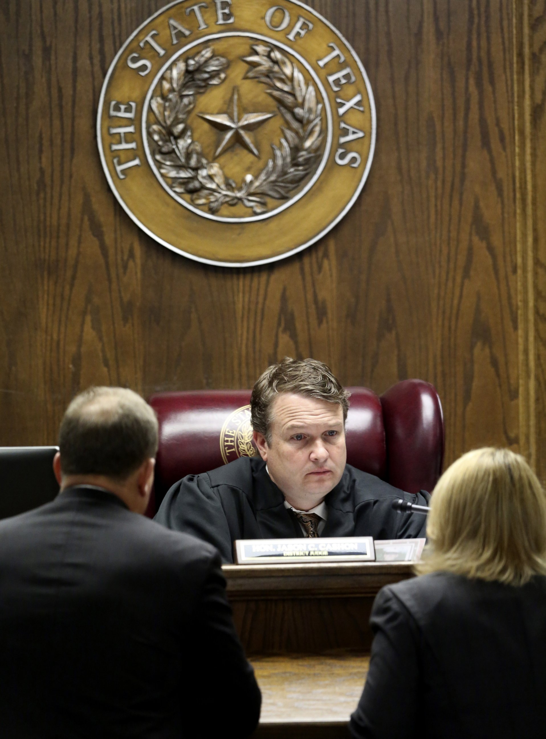 PHOTO: State District Judge Jason Cashon speaks to attorneys during the capital murder trial of former Marine Cpl. Eddie Ray Routh on Feb. 19, 2015, in Stephenville, Texas.